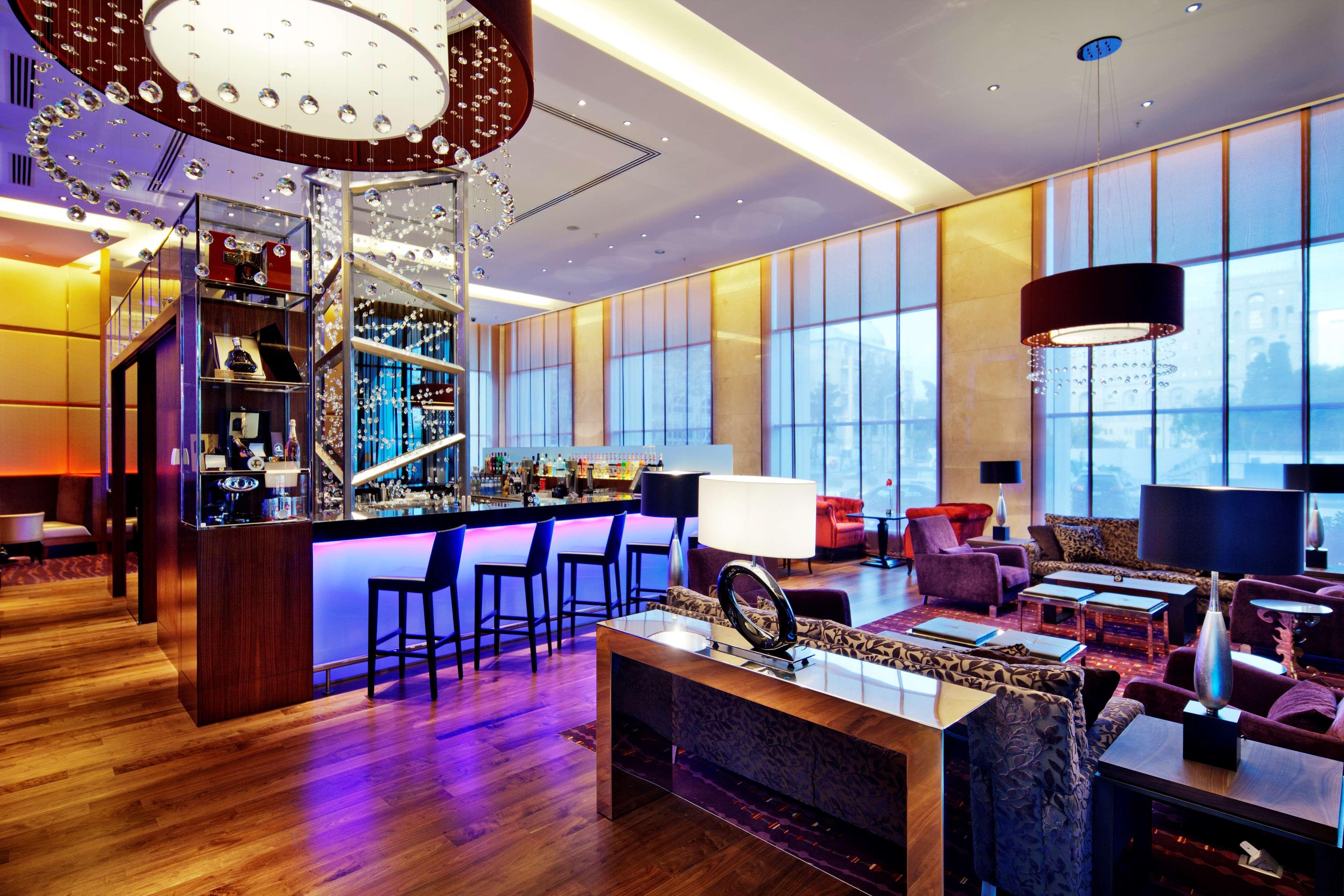 Hilton Baku Hotel Exterior photo The W Lounge at Hong Kong International Airport